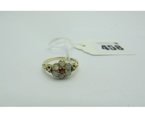 A Victorian Style 9ct Gold Opal and Garnet Cluster Ring, of flowerhead design, between textured shoulders (finger size O). 