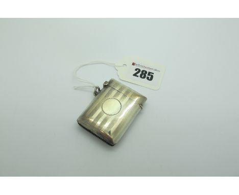 A Hallmarked Silver Vesta Case, allover engine turned stripe decoration, with suspension loop. 