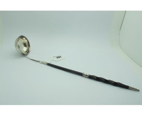 A Georgian Toddy Ladle, the plain bowl with side spout, stamped maker's mark and twisted handle, overall length approximately