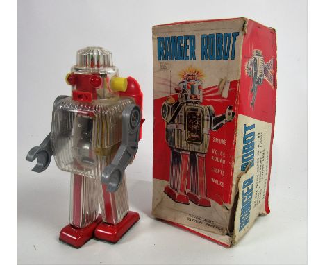 Juvenalia: A rare 1950's Ranger Robot, battery powered Japanese Toy, made of plastic and tin, with retractable antenna, in or