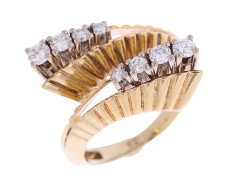 A 1960s diamond torque ring, set with graduated modern round brilliant-cut diamonds, total diamond content approx 0.25ct, app