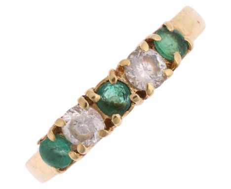 An 18ct gold five stone emerald and diamond half hoop ring, total diamond content approx 0.3ct, setting height 3.9mm, size O,