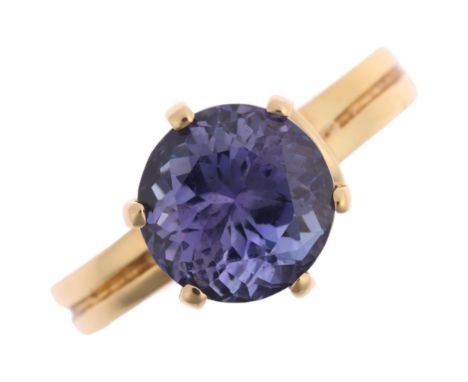 An 18ct gold single stone tanzanite ring, claw set with 3ct round-cut tanzanite, tanzanite weight calculated from dimensions: