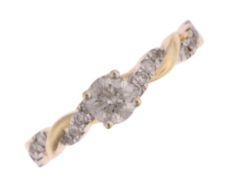 A modern 9ct gold 0.3ct solitaire diamond ring, centrally claw set with 0.3ct modern round brilliant-cut diamond flanked by t