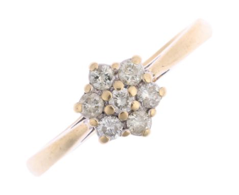 A 9ct gold diamond flowerhead cluster ring, set with modern round brilliant-cut diamonds, total diamond content approx 0.25ct