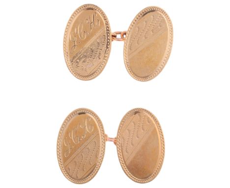 A pair of mid-20th century 9ct gold oval cufflinks, maker HG&S, Birmingham 1957, engine turned decoration, 20.3mm, 5.4g Condi