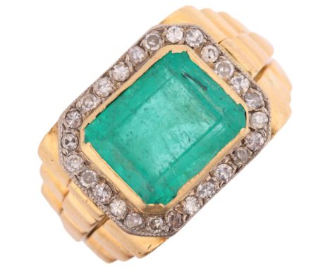 A large 18ct gold emerald and diamond cluster ring, rub-over set with 6.8ct octagonal step-cut emerald surrounded by single-c