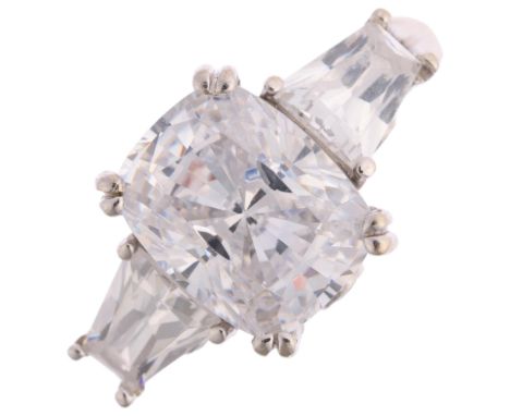 A 14ct white gold three stone cubic zirconia dress ring, setting height 10.8mm, size N, 5.3g Condition Report:No damage or re