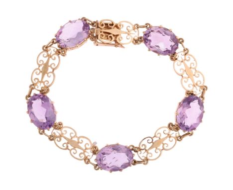 A 1960s 9ct gold amethyst panel bracelet, maker SJR, London 1968, claw set with oval mixed-cut amethysts, 19.5cm, 14.4g Condi