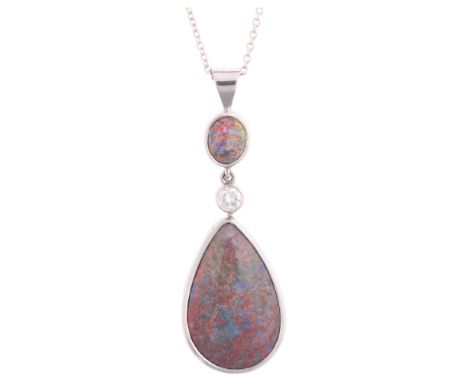 An 18ct white gold boulder opal and diamond drop pendant necklace, maker RL, London 2005, rub-over set with pear and oval cab