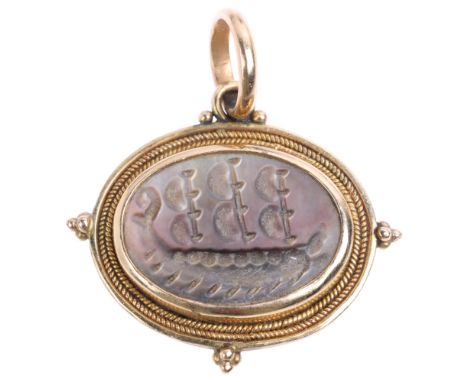 A Greek 14ct gold black mother-of-pearl ship seal pendant, width 26.3mm, 6g Condition Report:No damage or repair, only genera
