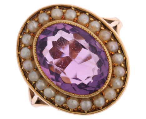 A Victorian 15ct gold amethyst and pearl oval cluster ring, rub-over set with oval mixed-cut amethyst surrounded by split pea