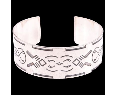 GEORG JENSEN - a Danish modernist sterling silver abstract cuff bangle, designed by Harald Nielsen, model no. 64, band width 