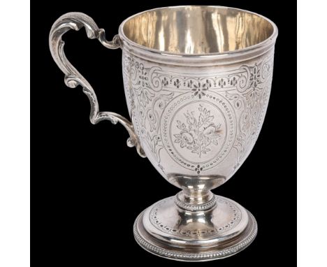 A Victorian silver christening mug, William Evans, London 1869, bright-cut engraved decoration, with beaded rim and acanthus 