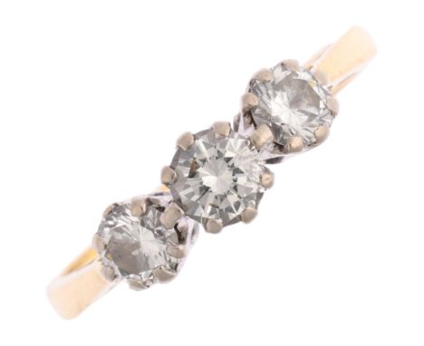 An 18ct gold three stone diamond ring, claw set with modern round brilliant-cut diamonds, total diamond content approx 0.8ct,