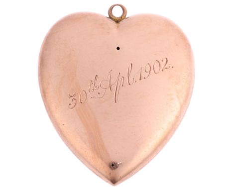 A large Antique rose gold 3-dimensional heart pendant, circa 1900, apparently unmarked, 35.9mm, 6g Condition Report:Front has