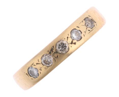A modern five stone diamond band ring, unmarked gold set with modern round brilliant-cut diamonds, total diamond content appr