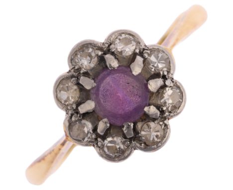 An 18ct gold amethyst and diamond flowerhead cluster ring, platinum-topped set with single-cut diamonds, total diamond conten