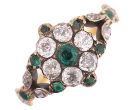 A Georgian emerald green paste and diamond flowerhead cluster ring, circa 1810, cut-down collet set with central emerald surr