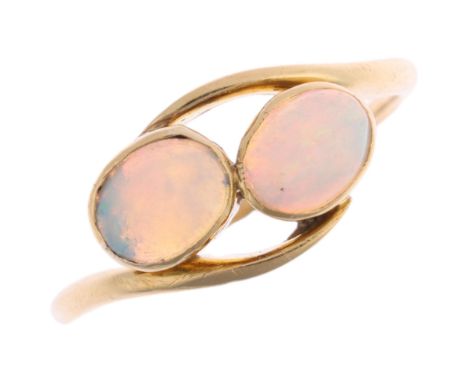 An 18ct gold two stone opal crossover ring, rub-over set with oval cabochon opals, setting height 8.5mm, size L, 2.4g Conditi