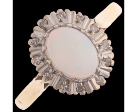 An 18ct gold opal and diamond oval cluster ring, maker FG, indistinct hallmark, setting height 12.1mm, size S, 3.5g Condition