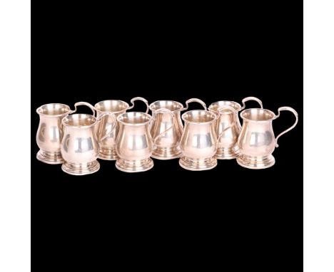 A cased set of 8 George V novelty silver miniature tankard drinking tots, Adie Brothers Ltd, Birmingham 1950, in the 18th cen
