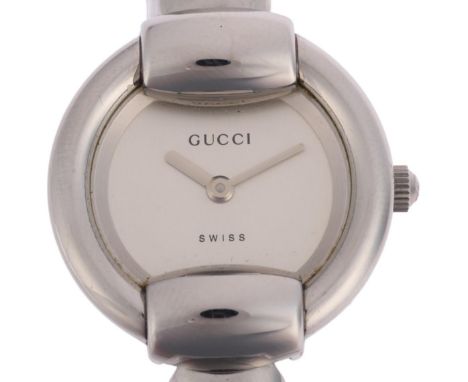 GUCCI - a lady's stainless steel 1400L quartz bangle watch, serial no. 0188862, case width 25mm, working order Condition Repo