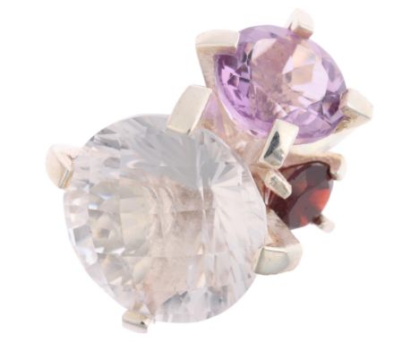 A modern sterling silver gem set abstract ring, maker YC, London 2023, claw set with rock crystal amethyst and garnet, rock c