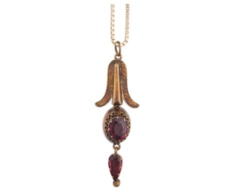 A Victorian Etruscan Revival garnet pendant necklace, circa 1880, set with oval and pear-cut garnets, with closed-back settin