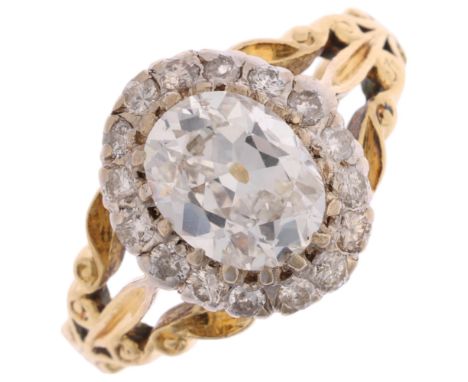 An 18ct gold 1.35ct lab grown diamond cluster ring, centrally claw set with 1.3ct oval mixed-cut lab grown diamond, surrounde