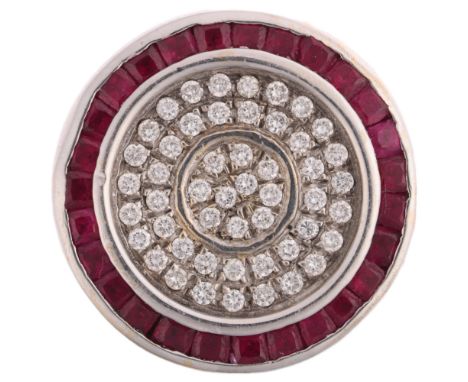 A large modern 18ct white gold ruby and diamond cluster target ring, set with calibre-cut rubies and modern round brilliant-c