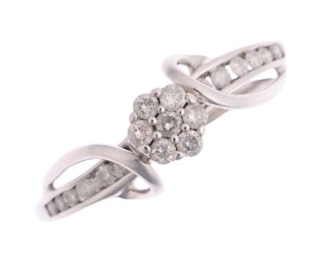 A modern 9ct white gold diamond flowerhead cluster ring, set with modern round brilliant-cut diamonds, total diamond content 