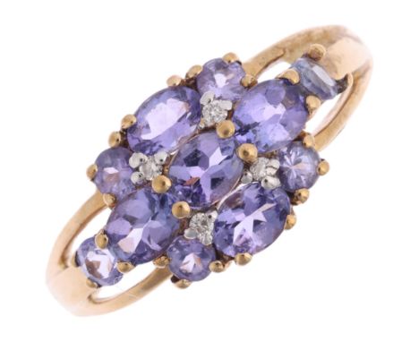 A 9ct gold tanzanite and diamond cluster ring, setting height 9.1mm, size N, 2.3g Condition Report:No damage or repair, all s