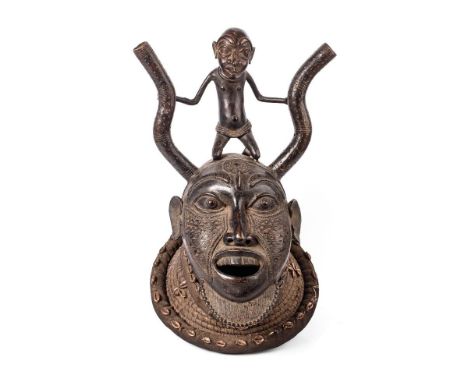 African Tribal Ceremonial Bronze Mask of large size possibly Benin Nigeria or Cameroon Tikar Bamileke Bamoun dark brown patin