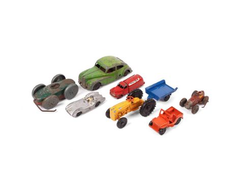 A collection of tinplate and clock work toys by manufacturers such as METTOY and other pre-war examples. Together with vintag
