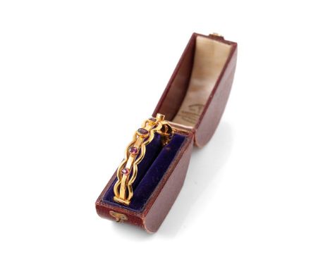 Cased yellow metal (tests as 9ct gold or higher) bangle, set graduated Amethyst stones with safety chain in period box. Retai