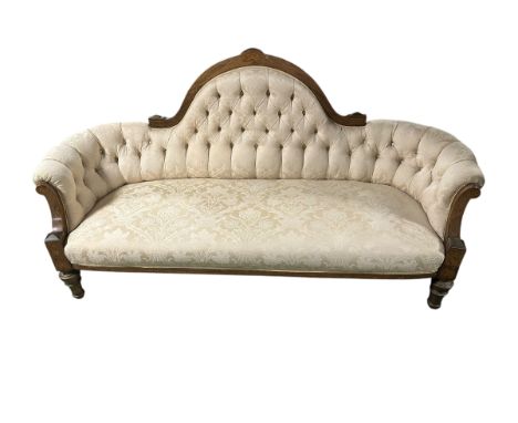 A good Victorian walnut show framed button back cream upholstered settee.  178 cm W x 67 cm D x 91 cm H.  General wear some m