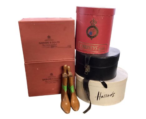Five vintage hat boxes including Christy's, Harrods, Garrard &amp; Co Ltd the Crown Jewellers, etc and a pair of wooden boot 