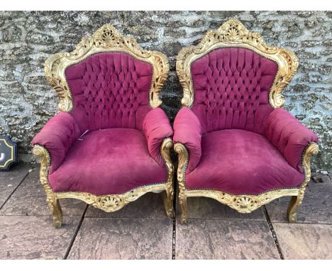 A pair of upholstered button back gilt painted armchairs and a set of six metal garden chairs 