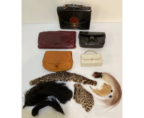 A quantity of vintage handbags, including burgundy leather Loewe oversized purse, three further leather and a evening bag wit