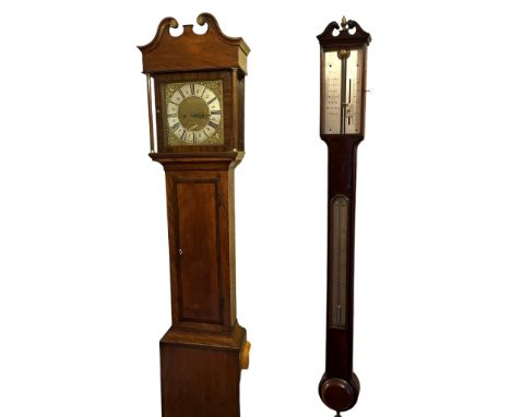 A long case clock and a barometer. 