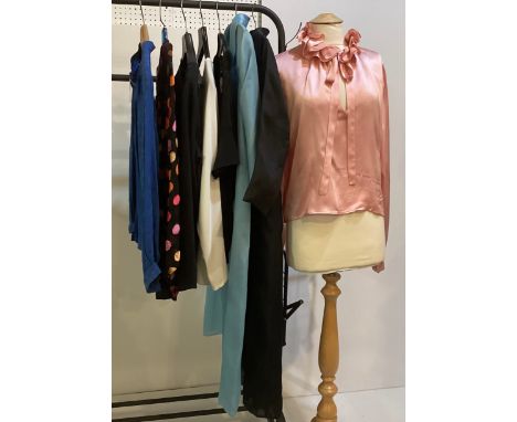 A quantity of later C20th clothes and tops, to include SAINT LAURENT pink shirt with ruffle collar and ribbon tie (makeup mar