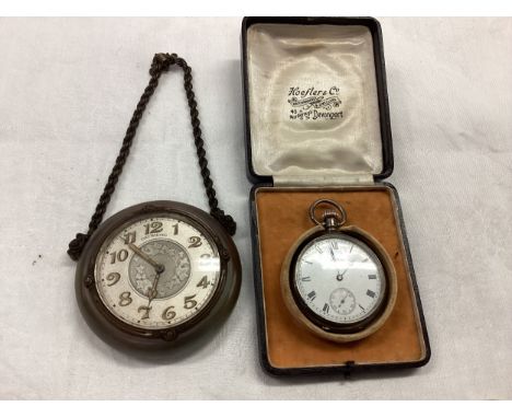 A sterling silver pocket watch , cased, Waltham, and another small circular clock, stamped DRUMMOND to dial, both with wear.