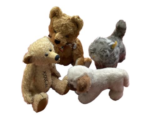 Two vintage teddies together with two Steiff toys. 