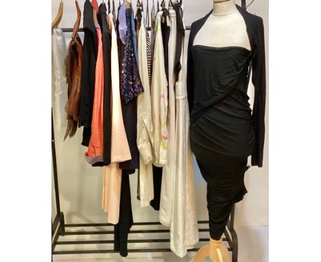 A quantity of designer clothes and other items to include GIORGIO ARMANI, EMPORIO ARMANI, WSL, ETRO, etc see all photos.