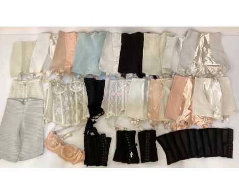A quantity of vintage undergarments - girdles and corsets,  some still with labels and tags, Mid C20th. Corseted underwear, g