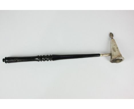 An Elizabeth II silver candle snuffer with dark wood handle, maker A J Poole, Birmingham 2001