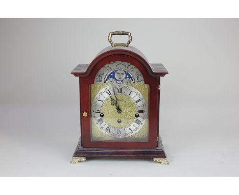 A reproduction Georgian bracket clock, the dial marked Hermle, 33cm