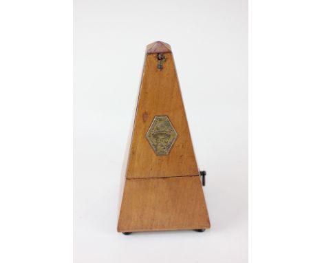 A Maelzel Metronome, the brass plaque marked 'France, Paris, Hollande, Angleterre, Amerique, Belgique'