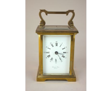A brass and bevelled glass cased carriage clock, the face marked Bornand Frères Bicester, the movement similarly marked, 14.5